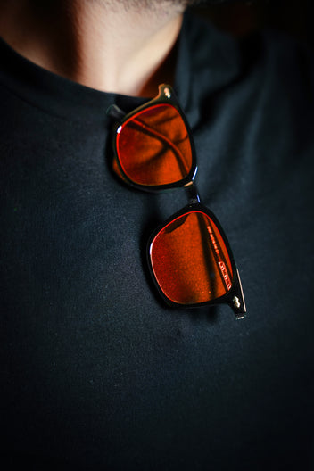 Black Frame — Orange Lens