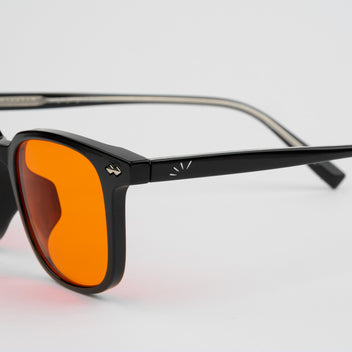 Black Frame — Orange Lens